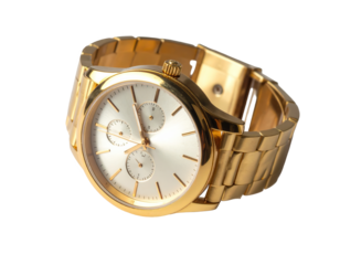 A gold-toned wristwatch with a silver dial displays a modern, sophisticated style.