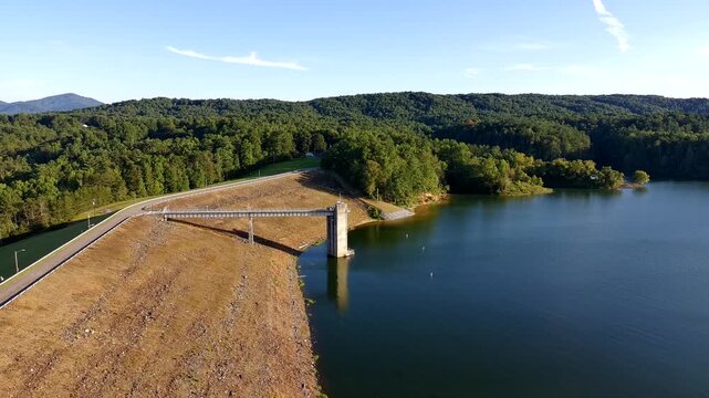 Drone Clip of an earthen dam in North Carolina on a bright sunny day