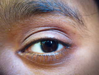 Expressive Dark Eye with Detailed Brow