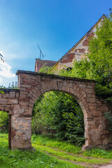 Obraz premium Broum style architecture, a bridge near the farm, Eastern Czechia