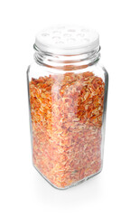 Dried carrots in glass jar isolated on white. Aromatic spice
