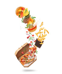 Freshly baked spicy pizza with burger and baked potatoes in the air isolated on a white background