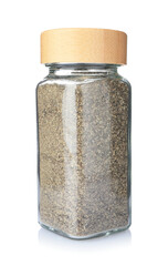 Ground black pepper in glass jar isolated on white. Aromatic spice