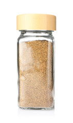 Ground caraway (Persian cumin) in glass jar isolated on white. Aromatic spice
