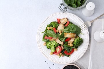 Tasty salad with eryngium mushrooms served on light table, flat lay. Space for text