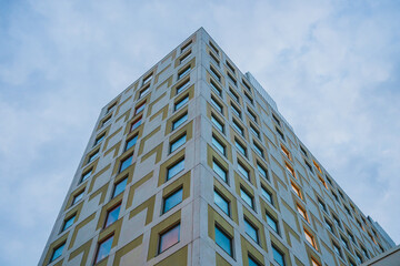 High rise building corner perspective at twilight.