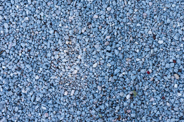 Gravel texture with small blue-gray stones
