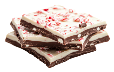 Festive peppermint bark pieces made with white and dark chocolate decorated with candy cane bits representing holiday sweetness and joy isolated on transparent background PNG