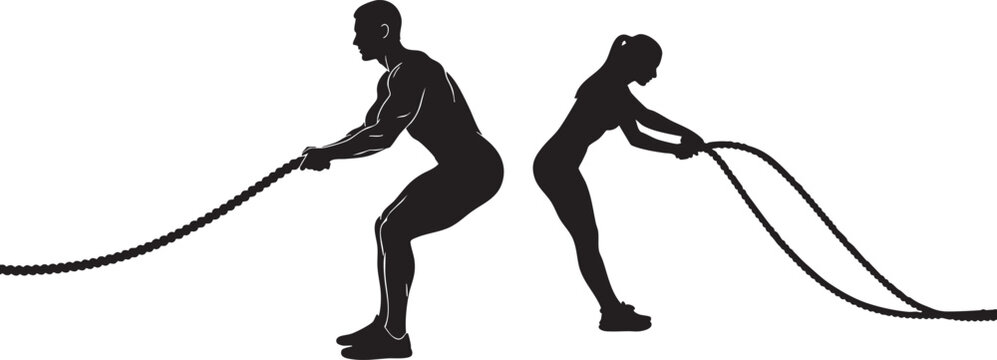Silhouette of a man and woman performing battle rope exercises fitness workout