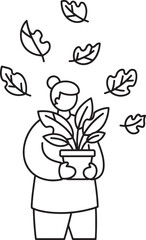 Fototapeta premium Woman Holding a Plant with Falling Leaves
