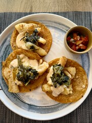 Authentic Mexican fish tacos with salsa on a plate