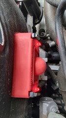 Ultrasonic marten repellent in engine