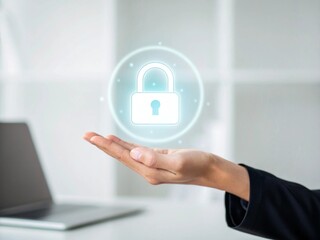 Hand holding holographic padlock icon in minimal white office setup symbolizing cyber security modern business environment digital protection concept