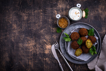 Middle Eastern falafel balls with sauce