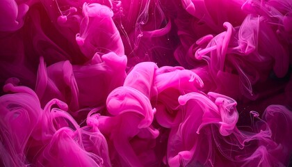 Fototapeta premium Abstract swirling clouds of vibrant pink dye, flowing and merging against a deep, shadowy background