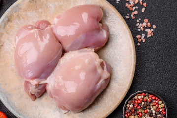 Raw chicken thigh fillet, poultry meat as a source of protein. Chicken thigh fillet
