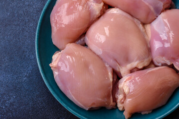 Raw chicken thigh fillet, poultry meat as a source of protein. Chicken thigh fillet