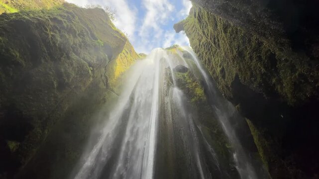Panning Down Inside Glj&uacute;frab&uacute;i Waterfall Cave, Iceland