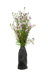 Handmade ceramic vase with a bouquet isolated on white background.