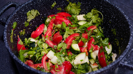Cucumber tomato salad in the pot