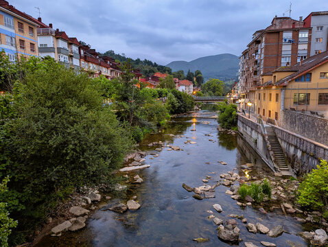 Pilo&ntilde;a river and Infiesto village at sunset , Asturias, Spain, Europe