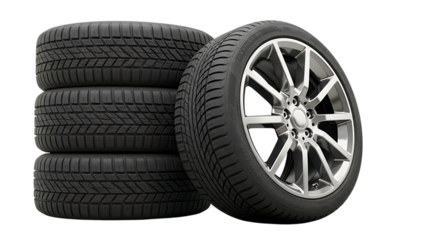Stack of four new car tires and one alloy wheel tire isolated on white background