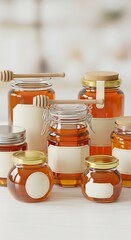 Multiple clear glass honey jars with wooden honey dippers and blank labels stand on a light-colored surface, showcasing a warm and inviting food presentation.