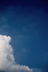 cloud at the left side with a blue sky