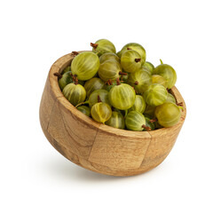 gooseberries in a wooden plate on a white isolated background