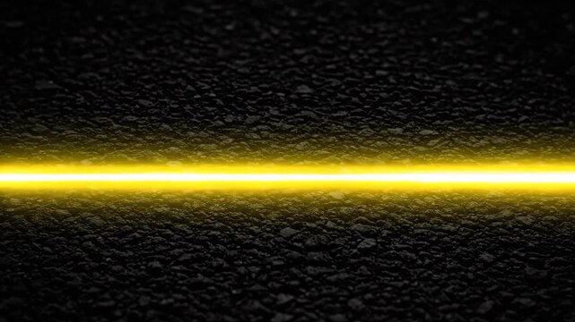Yellow glowing line on dark textured background  