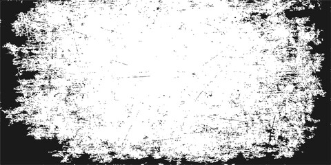 Grunge ink splatter and spray paint on a vintage dirty black and white paper background