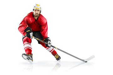 Hockey. Professional ice hockey player on defending position on the rink. Hockey player in action....