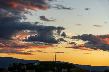 Pink clouds over the village of Mora de Rubielos at sunset, Teruel, Aragon, Spain