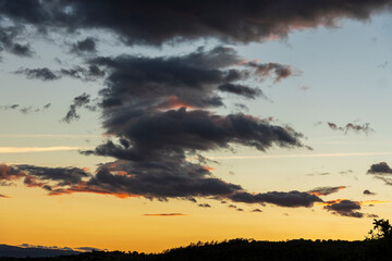 Pink clouds over the village of Mora de Rubielos at sunset, Teruel, Aragon, Spain