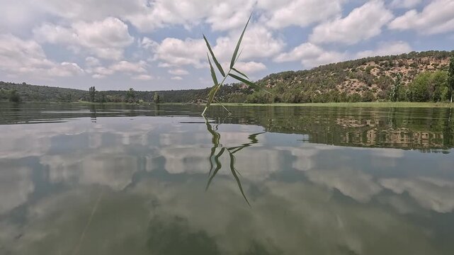 Rowing on the Valbona reservoir in Teruel, Aragon, Spain in summer