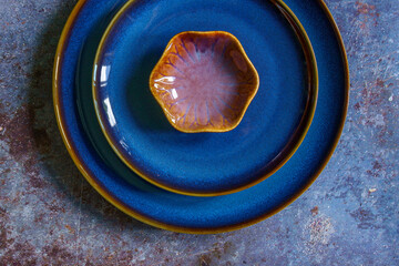 The flat lay composition of ceramic dishes. 