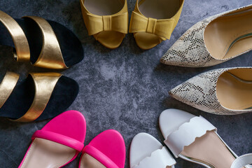 Women's shoes arranged in a circle.