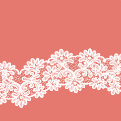 Intricate white lace trim overlay on a salmon-pink background