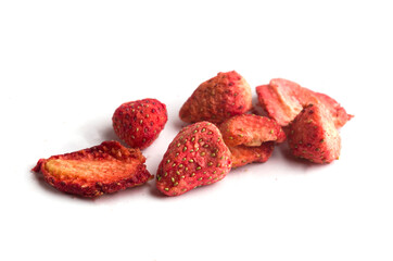 Freeze-dried whole strawberries on a white background