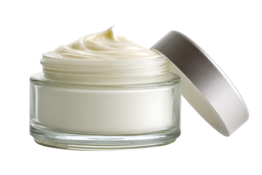 A glass jar of creamy, white face cream with its lid slightly ajar, showcasing its texture. background removed