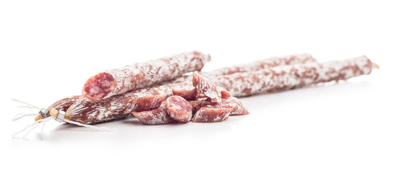 Sliced fuet sausage with mold isolated on white background.