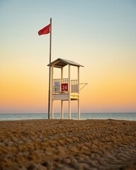 Lifeguard tower at sunset in bibione italy