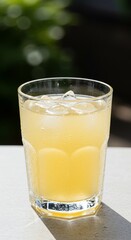  Refreshing Beverage: A bright and inviting shot showcases a glass of cool, clear, iced beverage, with the light dancing off the chilled refreshment in a perfect display of thirst-quenching allure.