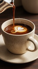 Artistic Coffee Pour: A barista's masterful touch transforms a simple cup of coffee into an art form, with the rich, dark brew cascading gracefully, creating a stunning heart-shaped latte art display.