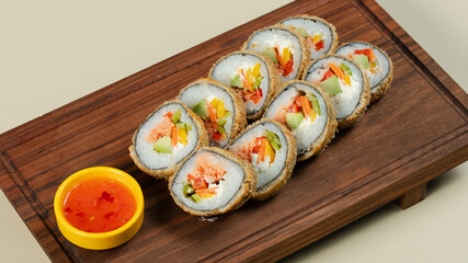 Hot sushi with soy sauce on tray