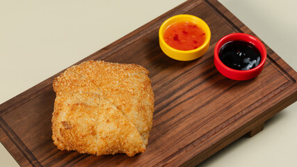Hot sushi burger on tray