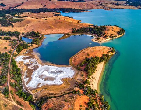 Aerial view of a scenic bay with a salt flat
