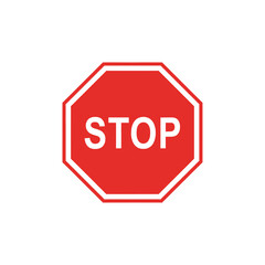 A red octagonal stop sign with the word 
