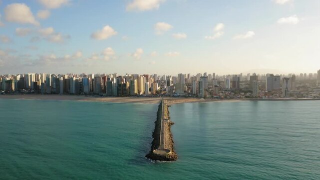 Aerial view of a pier extending into the ocean in fortaleza, brazil