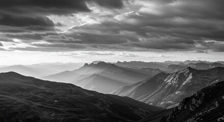 Dramatic mountain panorama bathed in ethereal light under moody, textured clouds